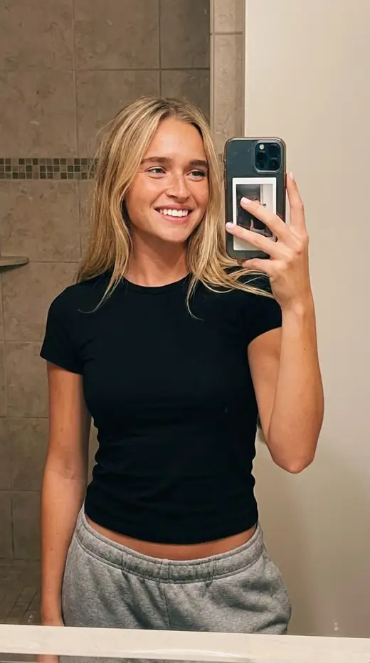 AI-generated influencer character: casual mirror selfie
